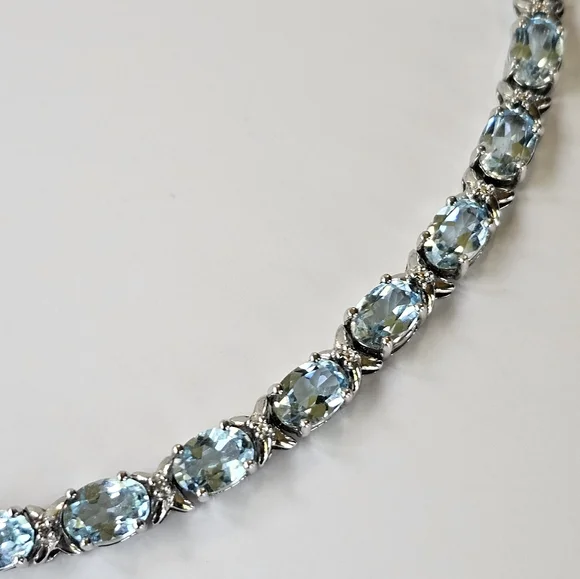 Natural Sky Blue Topaz & Diamond Accent Tennis Bracelet in Sterling Silver! - Picture 3 of 6
